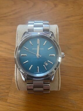 Michael Kors Men’s Silver Watch with Blue Sunburst Dial
